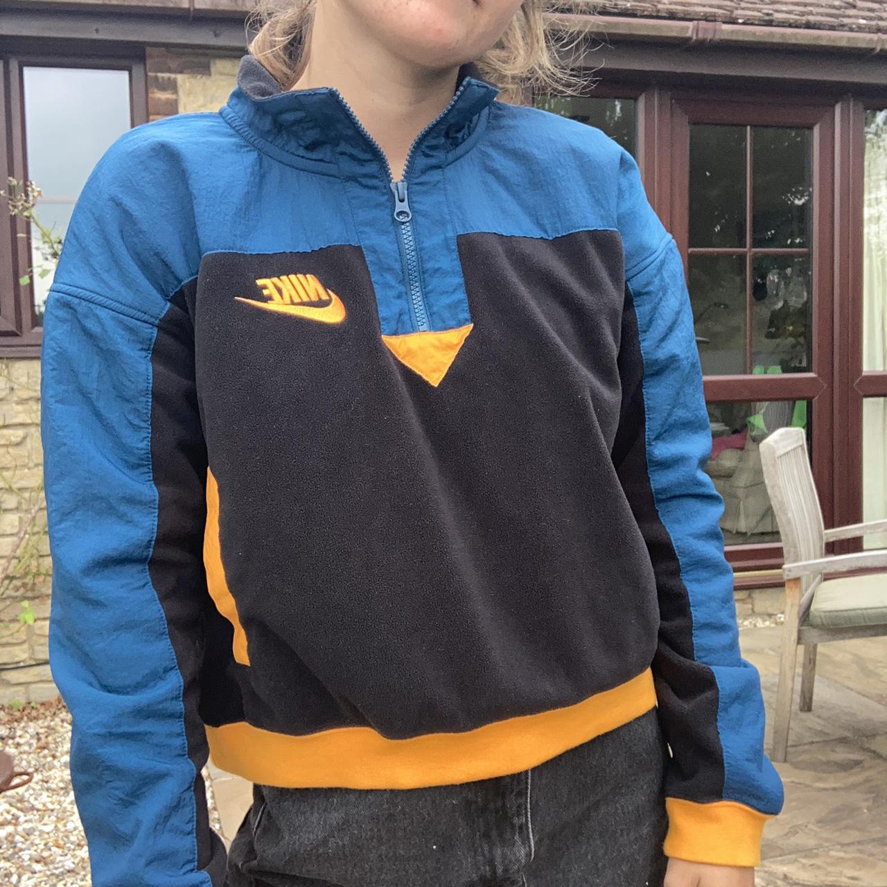 nike blue and orange polar fleece half zip sweatshirt