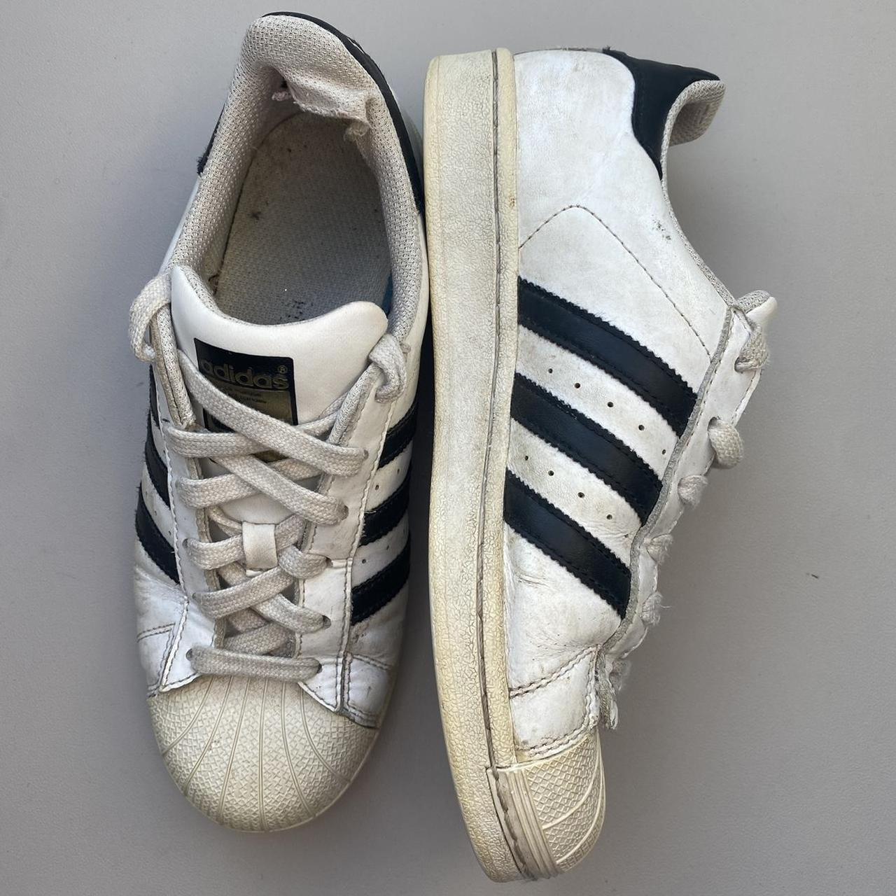 Adidas white with black stripes superstars trainers... - Depop