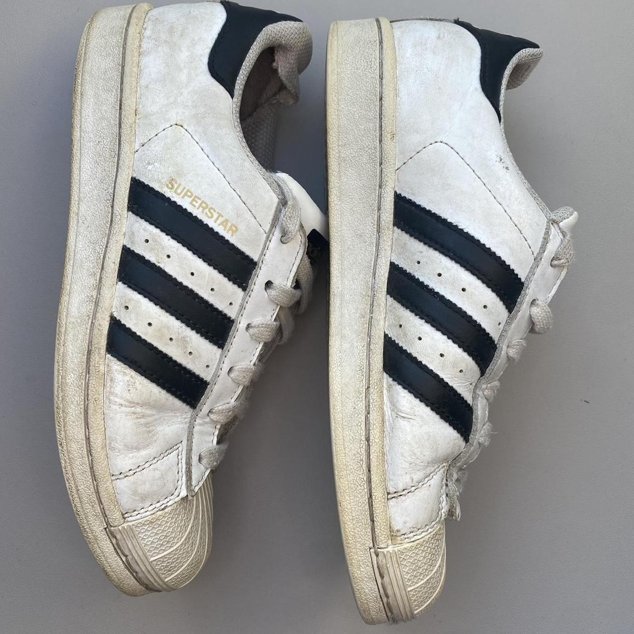 Adidas white with black stripes superstars trainers... - Depop