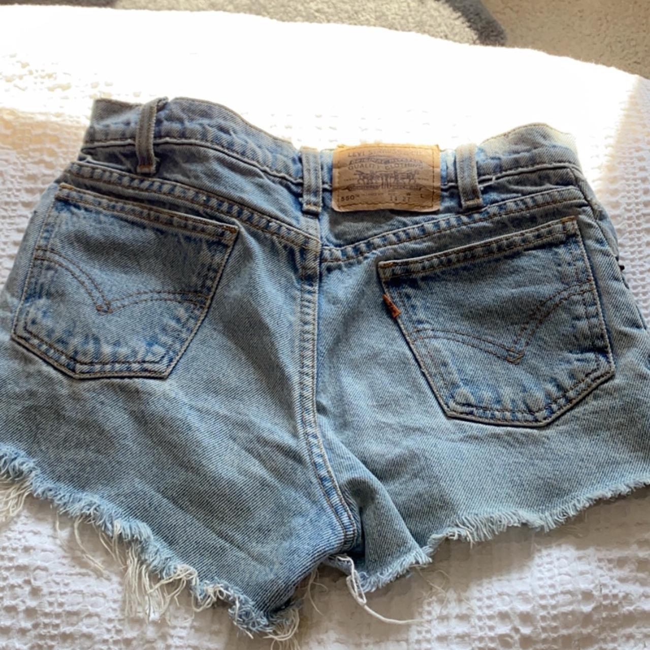Levi denim shorts. They say waist 27 and are small I... - Depop
