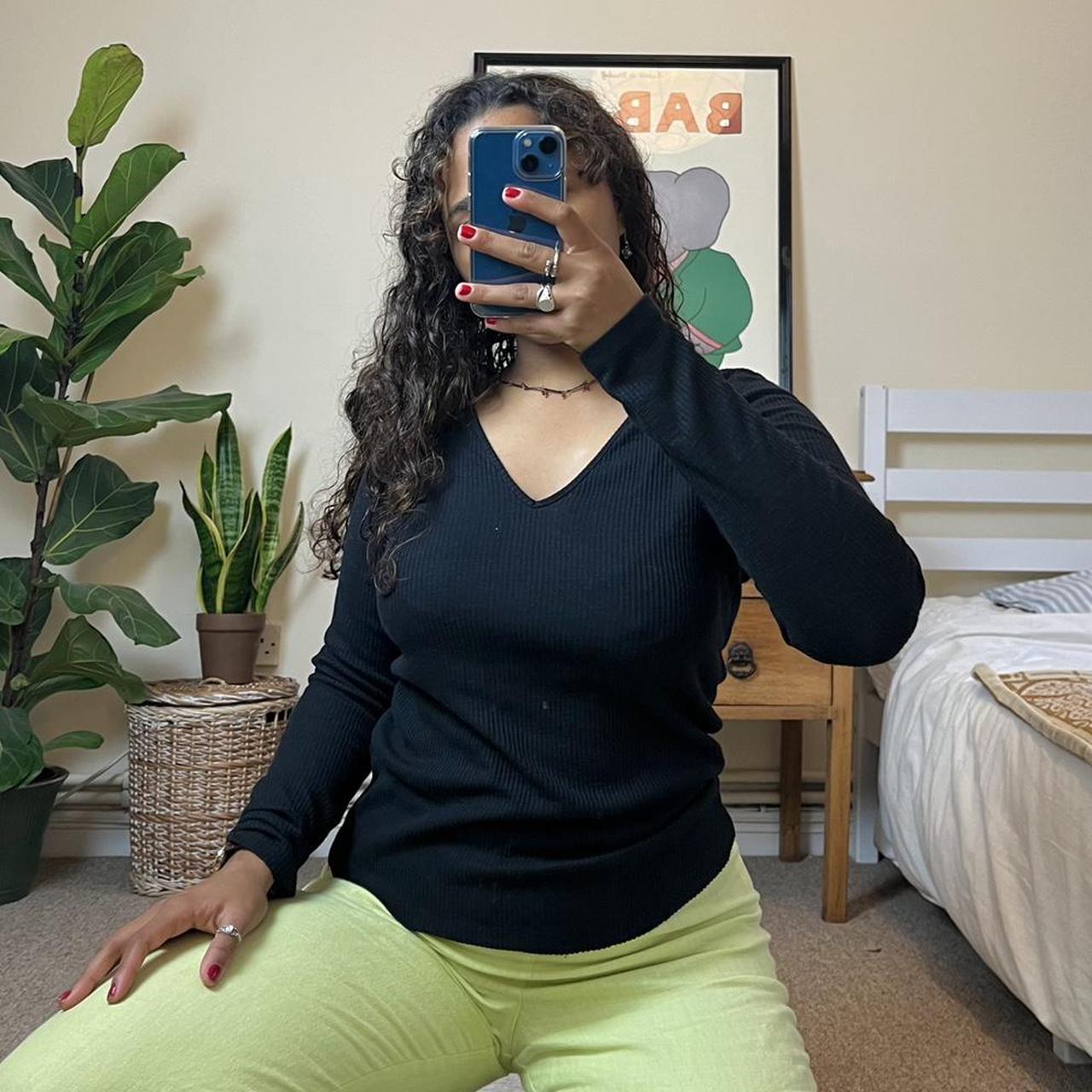 Black long sleeved ribbed top. Soft V neck. Stretchy... - Depop