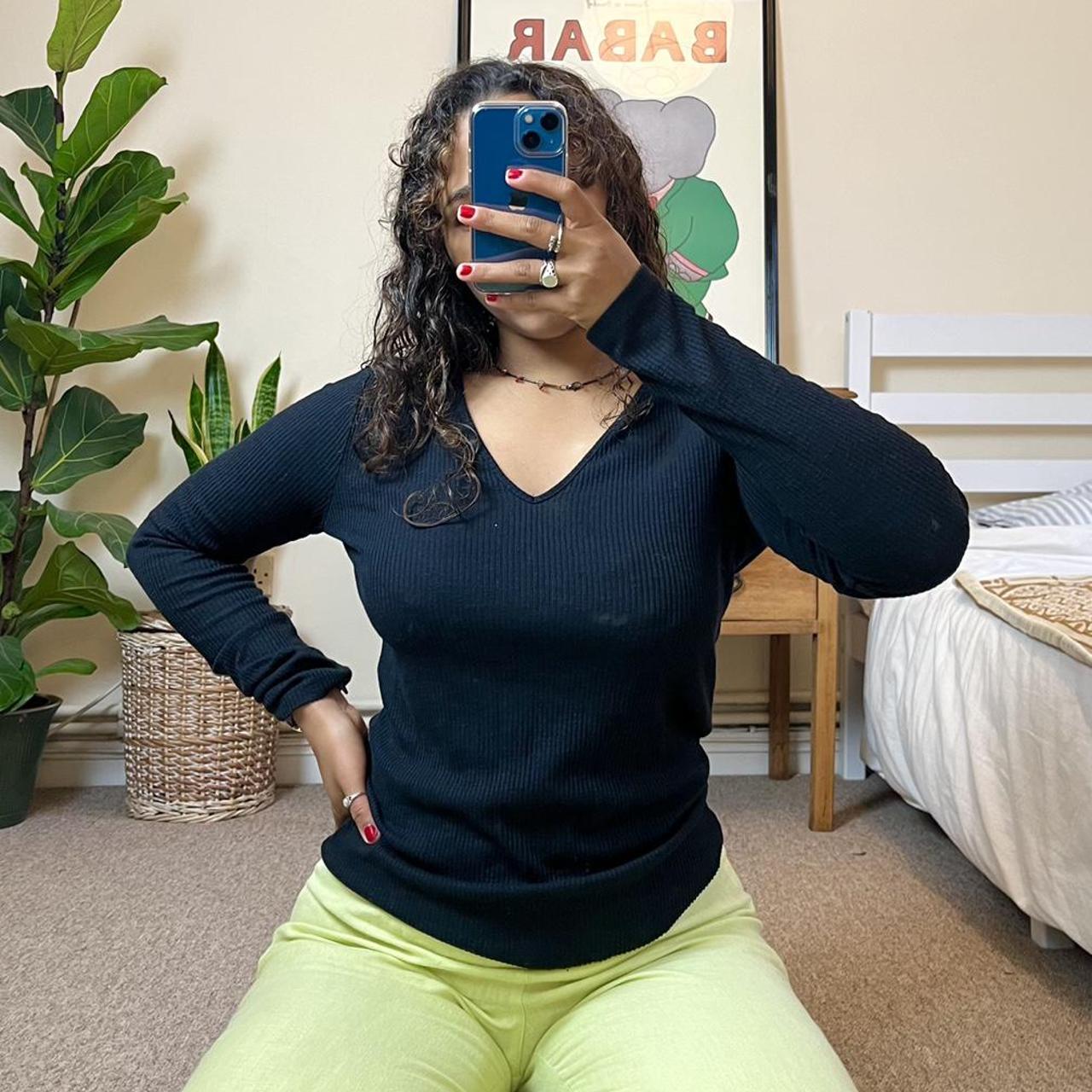 Black long sleeved ribbed top. Soft V neck. Stretchy... - Depop