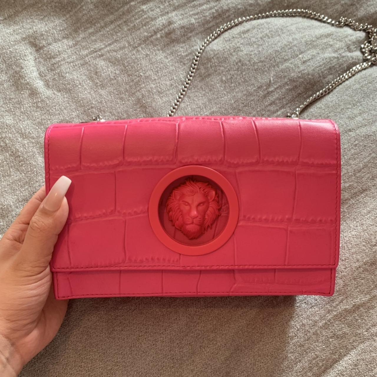 pink versace head purse