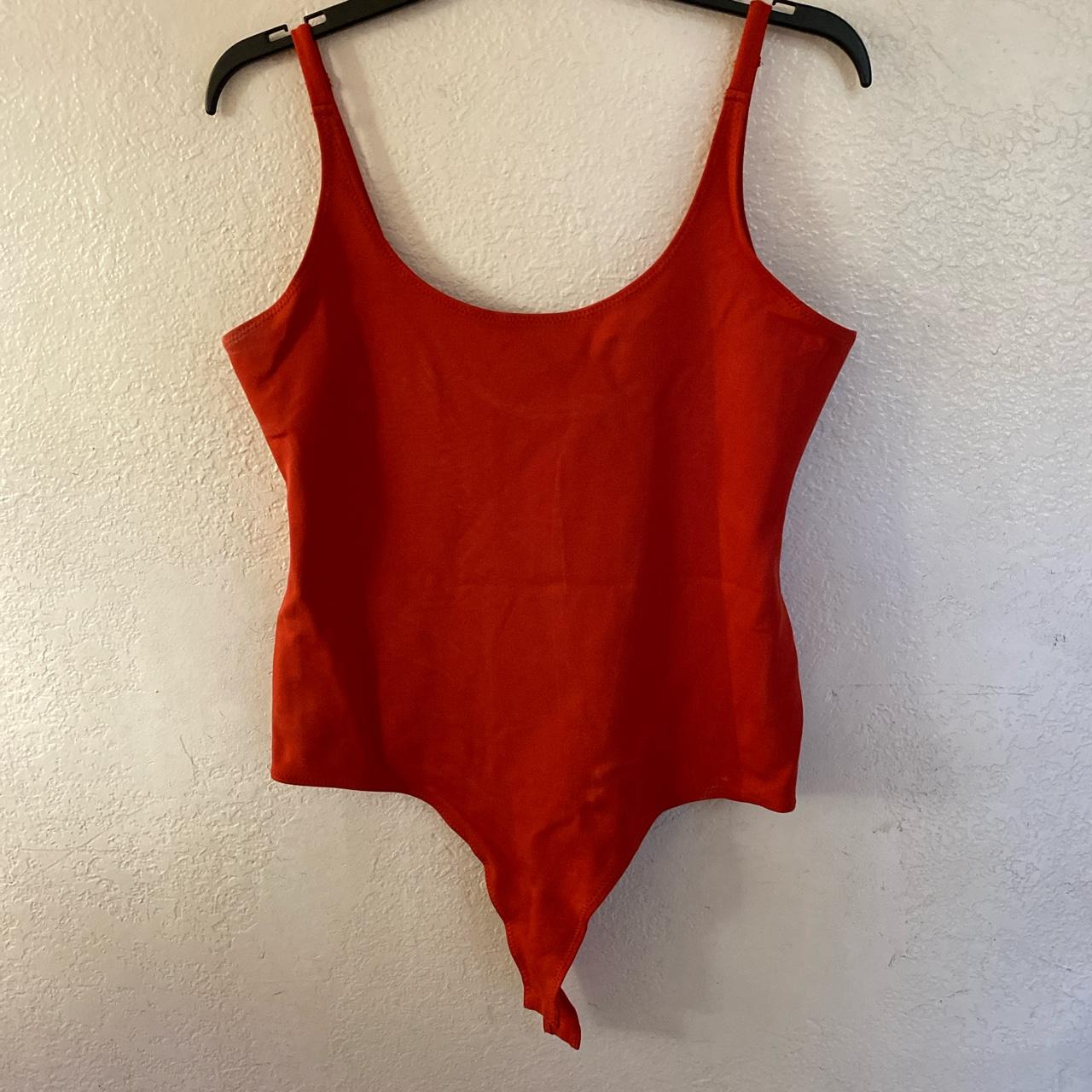Orange bodysuit. ⚠️PM before buying please⚠️ Depop