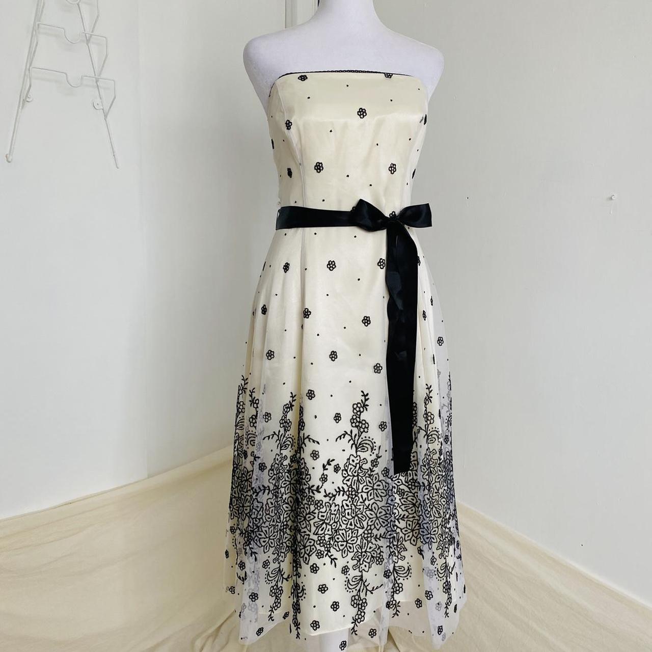 Vintage ivory and black beaded strapless dress by Depop