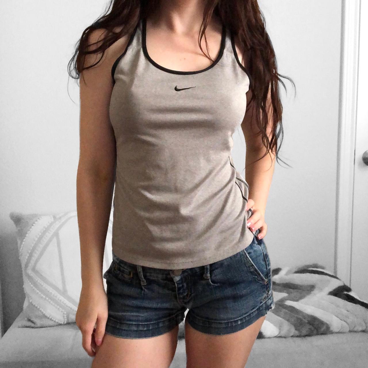 Grey tank top with black trimming. Fit dry Doesn’t... - Depop