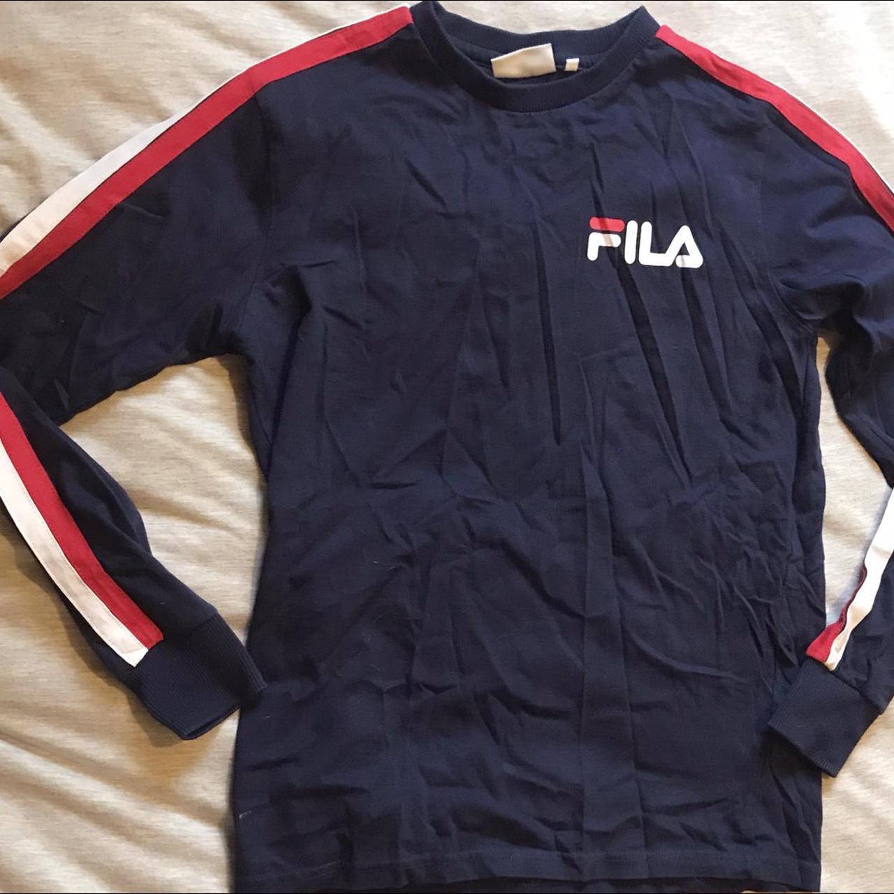 Navy Fila jumper with red and white striped sleeves... - Depop