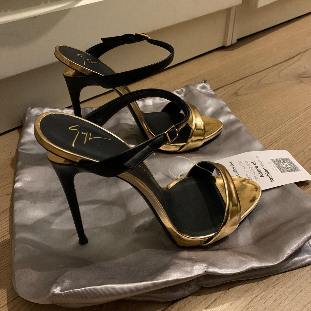 Giuseppe zanotti black shop and gold heels