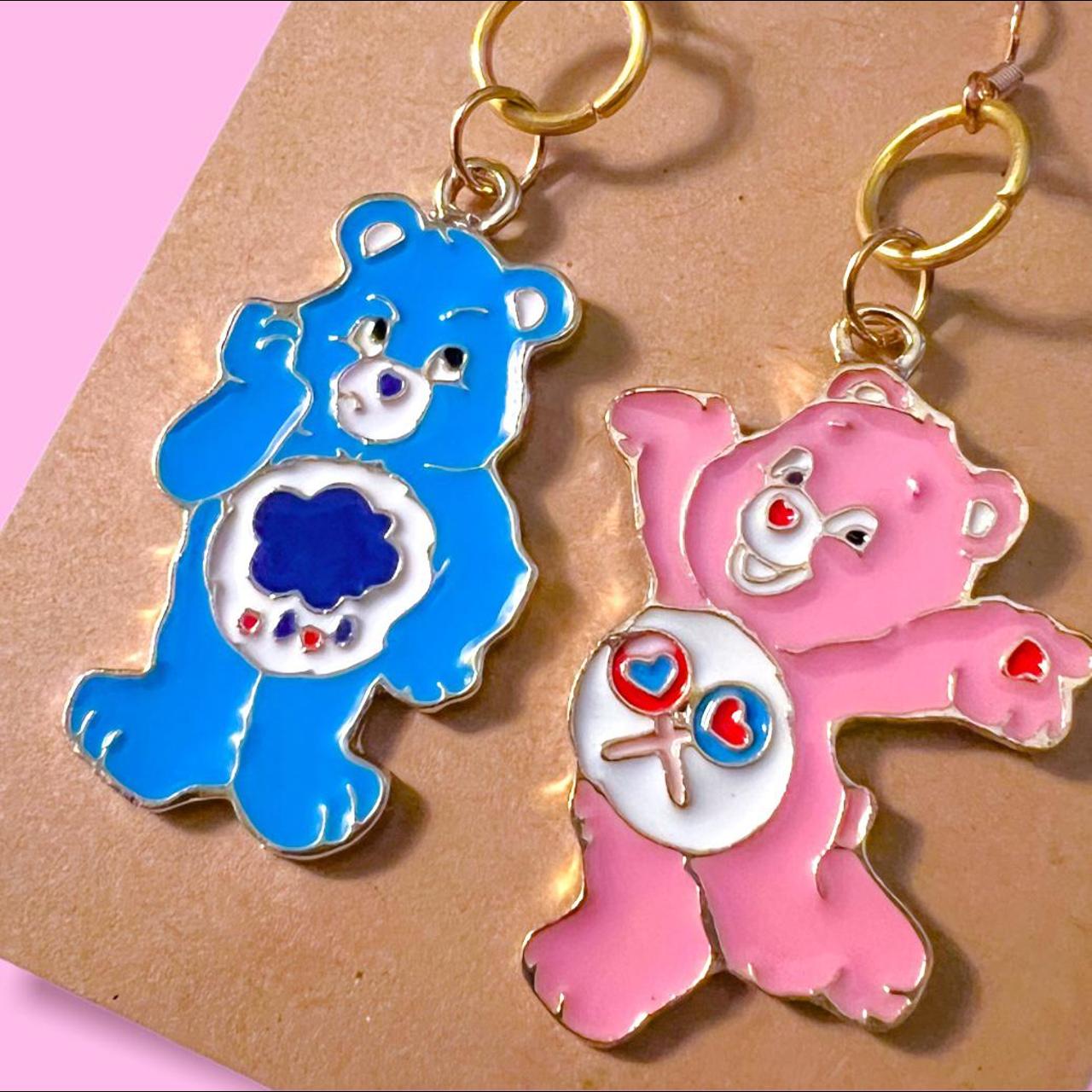 Mismatched Care Bear Earrings. One happy and pink,... Depop