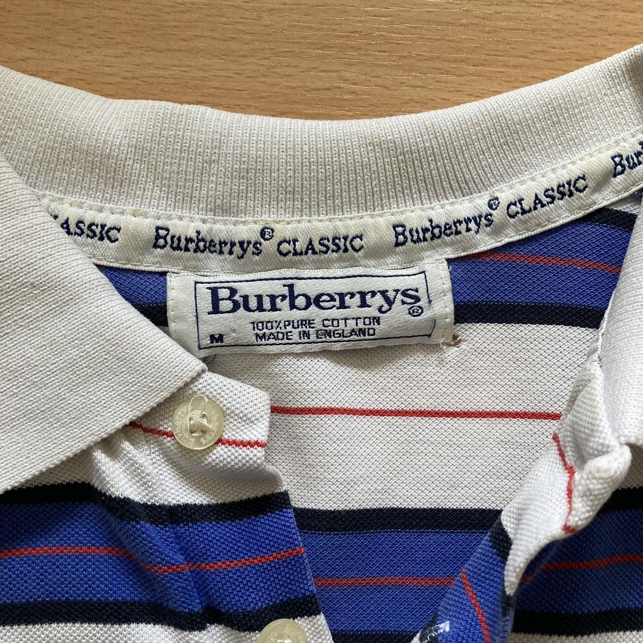 Classic Burberry dark navy polo shirt, size large , - Depop