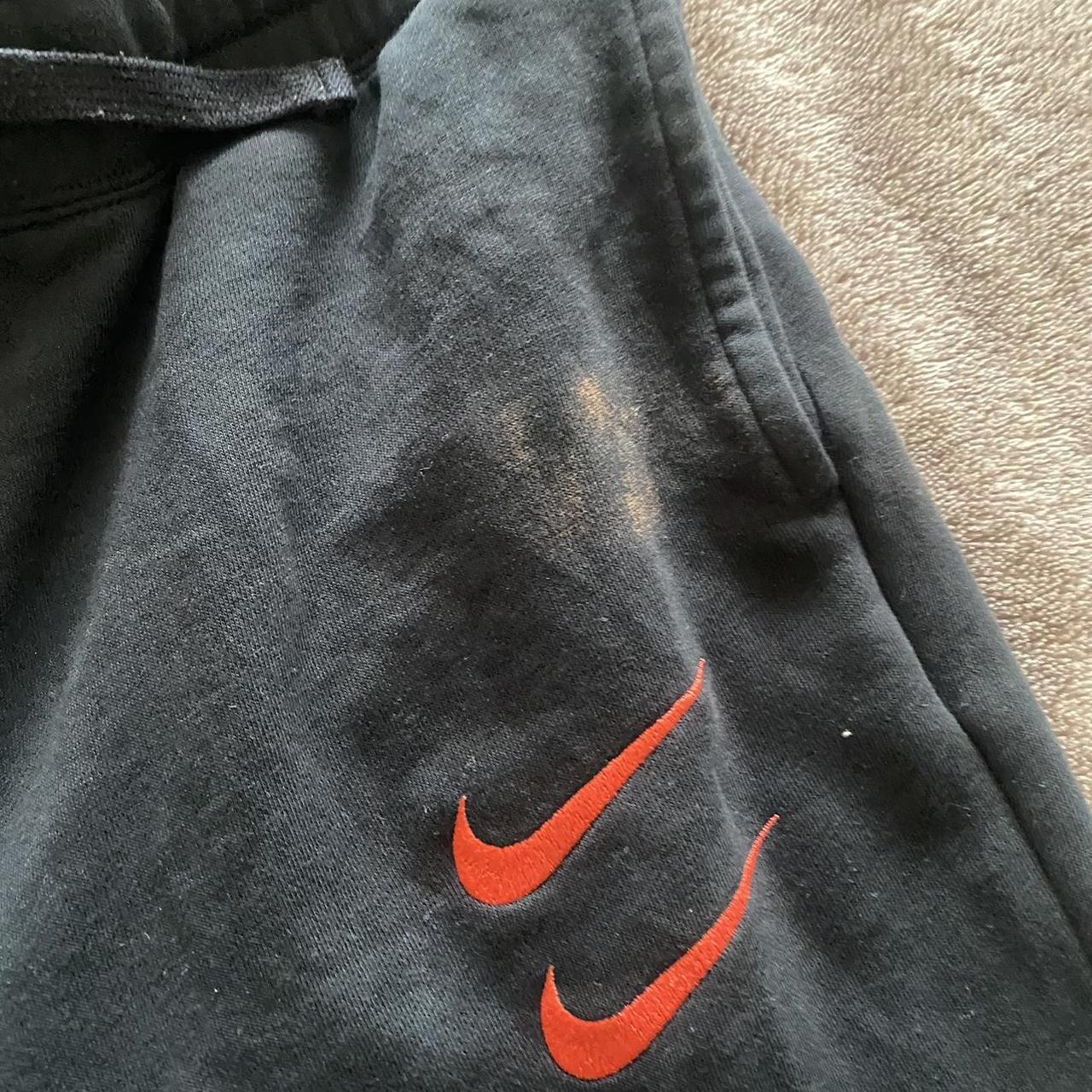swoosh tracksuit