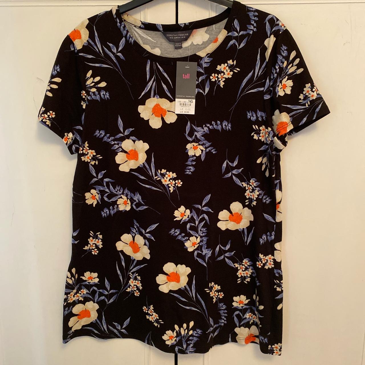 Black floral pattered T-shirt. Brand new with tags... - Depop