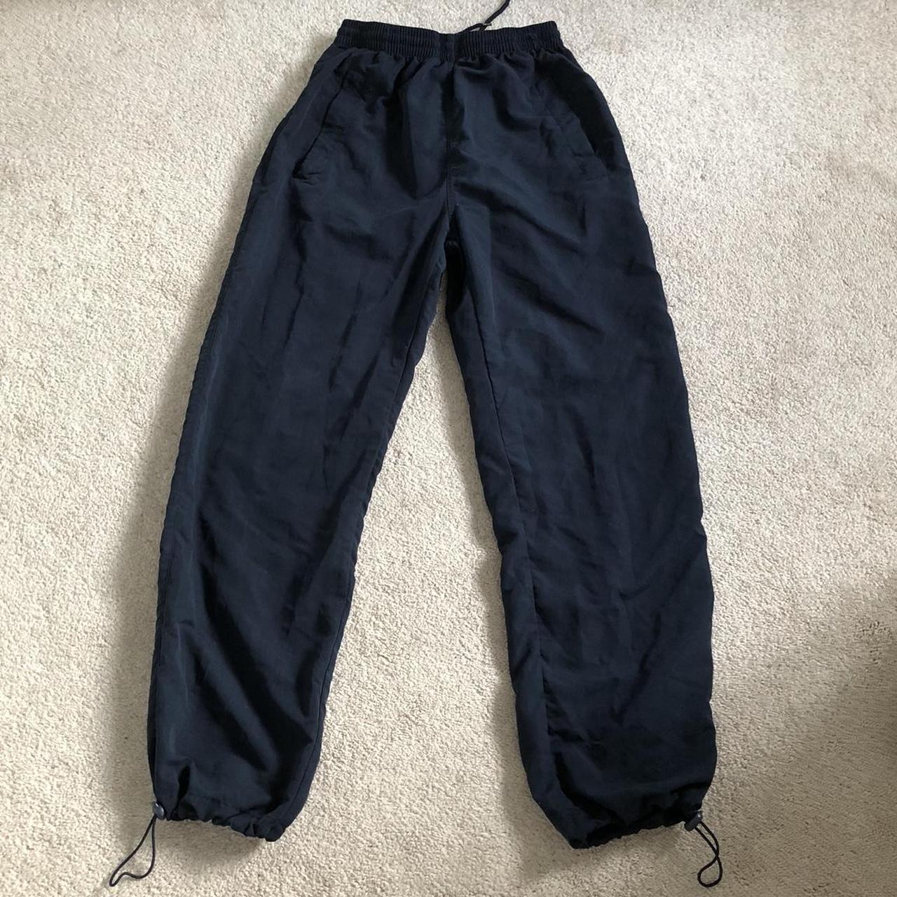Navy tracksuit bottoms/toggle cargo trousers in an... - Depop