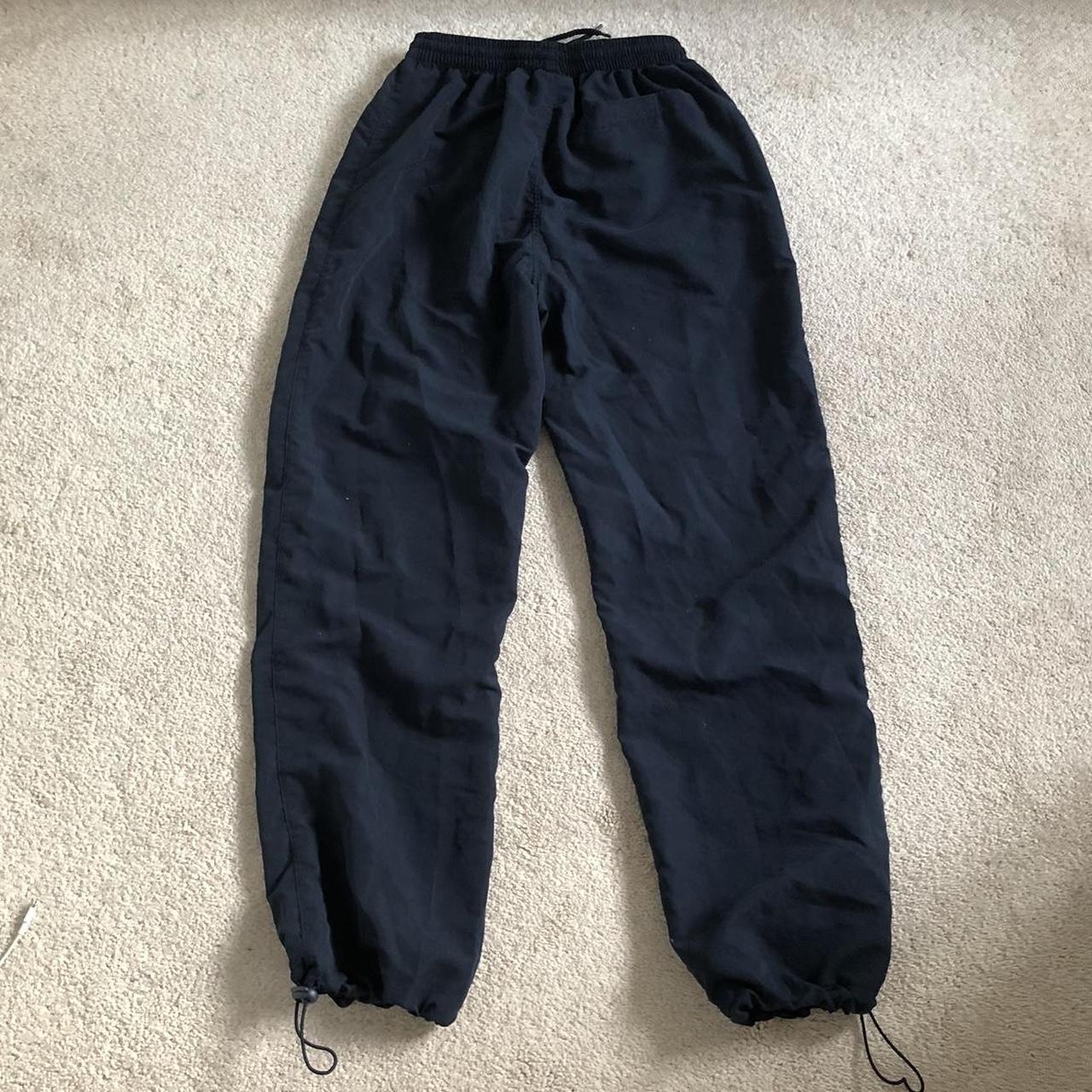 Navy tracksuit bottoms/toggle cargo trousers in an... - Depop