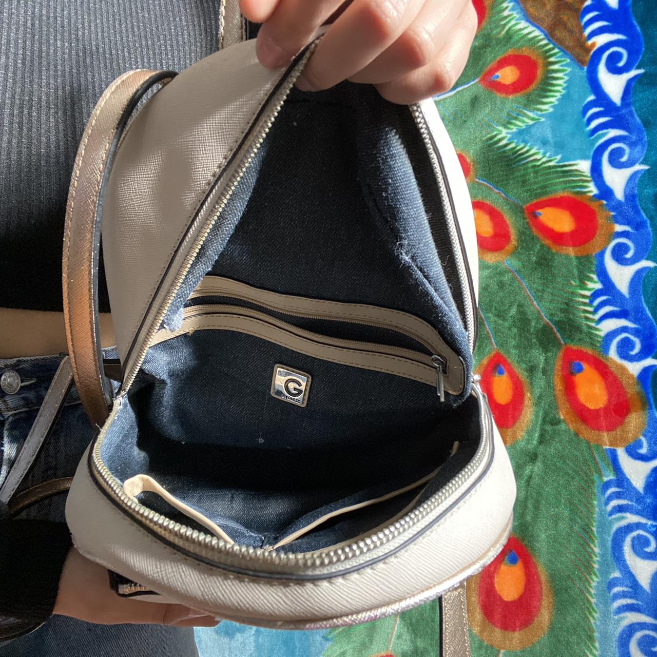 Baby pink Guess backpack. Perfect size to fit your... Depop