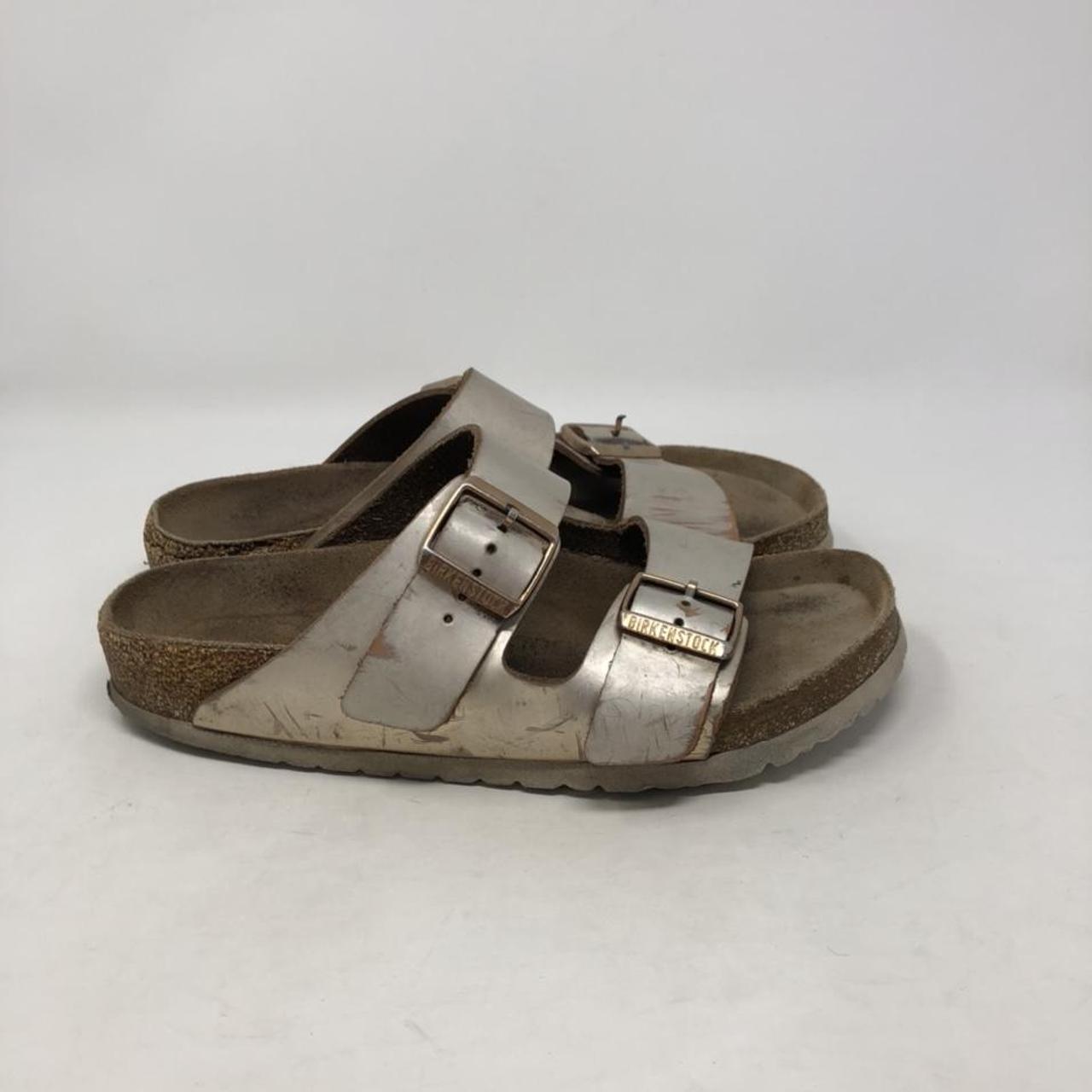 Birkenstock Sandals. Size 40. Ladies 9. Gold straps... - Depop