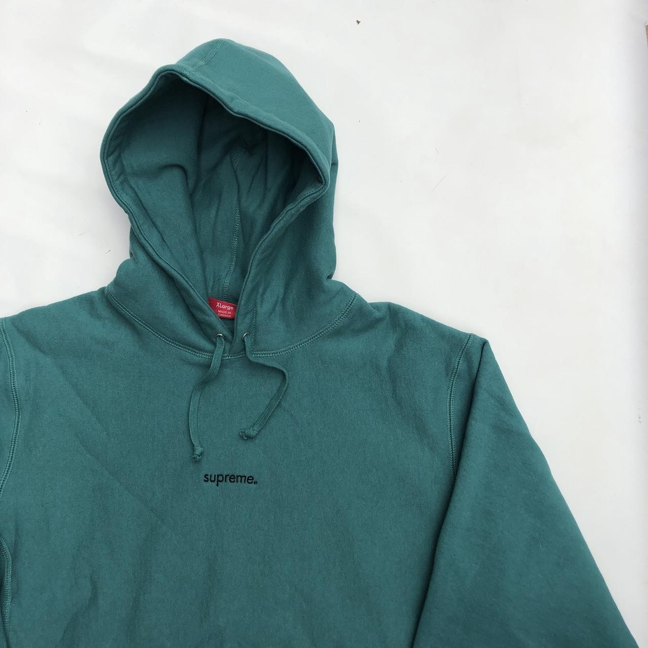 Supreme trademark hooded deals sweatshirt black