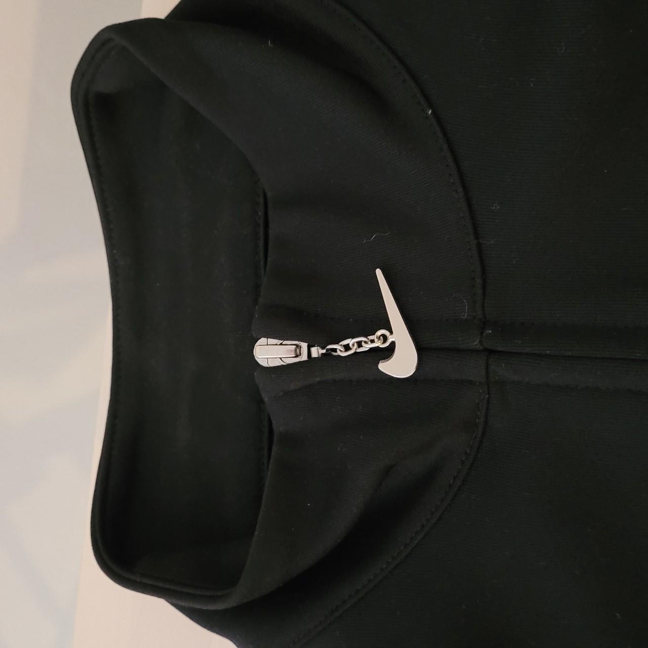 grey nike swoosh tracksuit