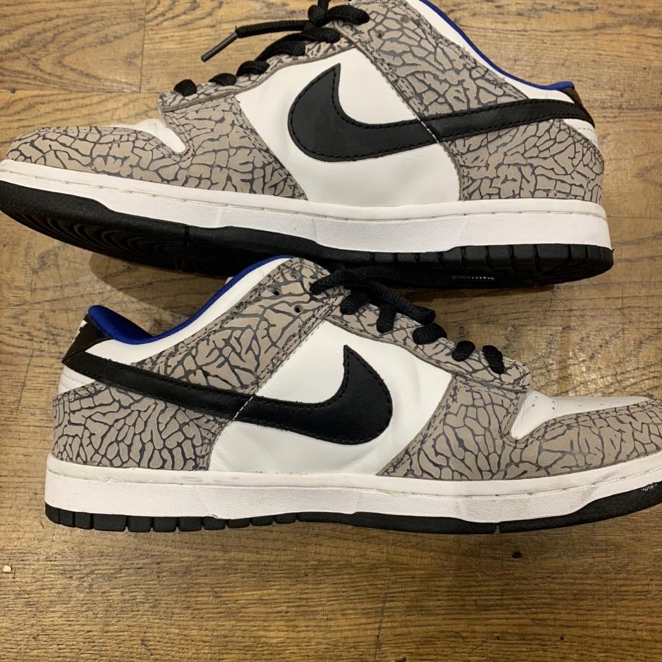 Nike dunk sb low supreme hot sale white cement