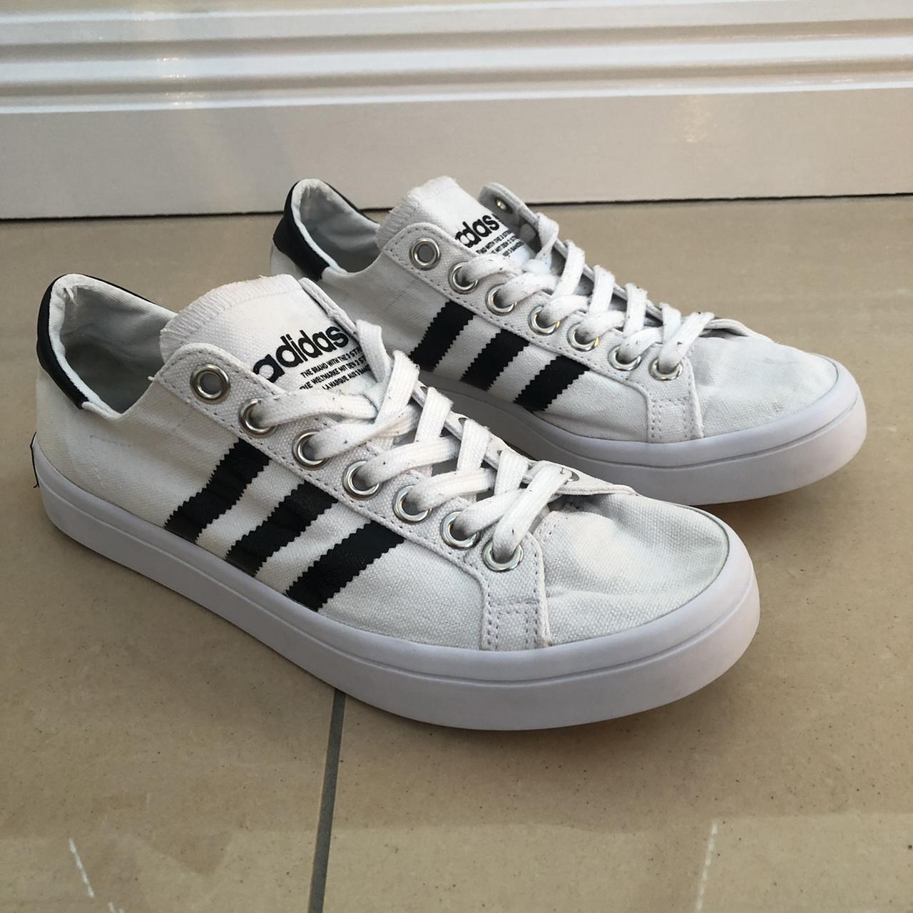 White Adidas canvas trainers. Worn but decent