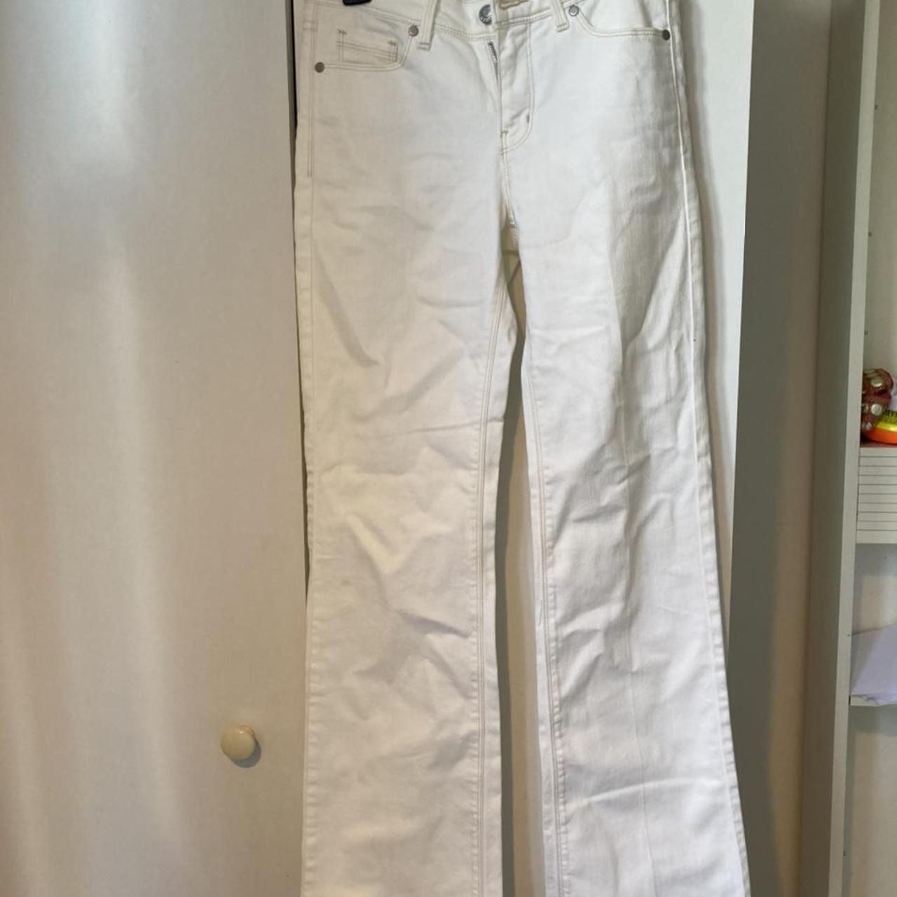 Cream flare jeans with contrast stitch Such a unique... Depop