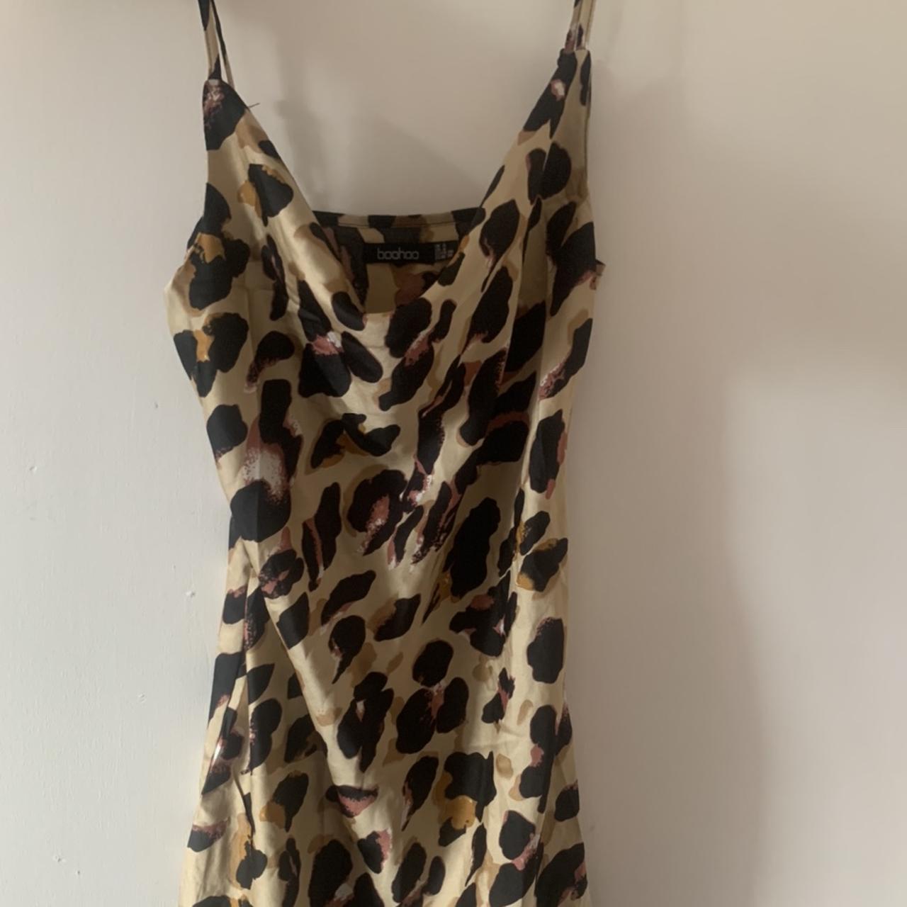 Leopard print dress shop with black top underneath