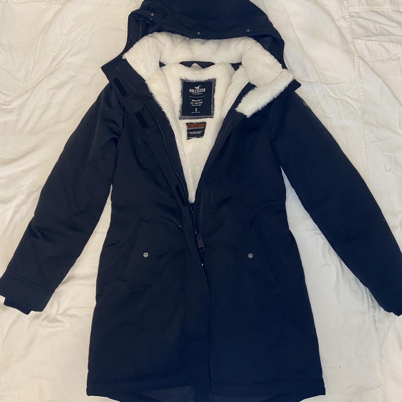 Black Hollister waterproof parka with fauxfur... Depop