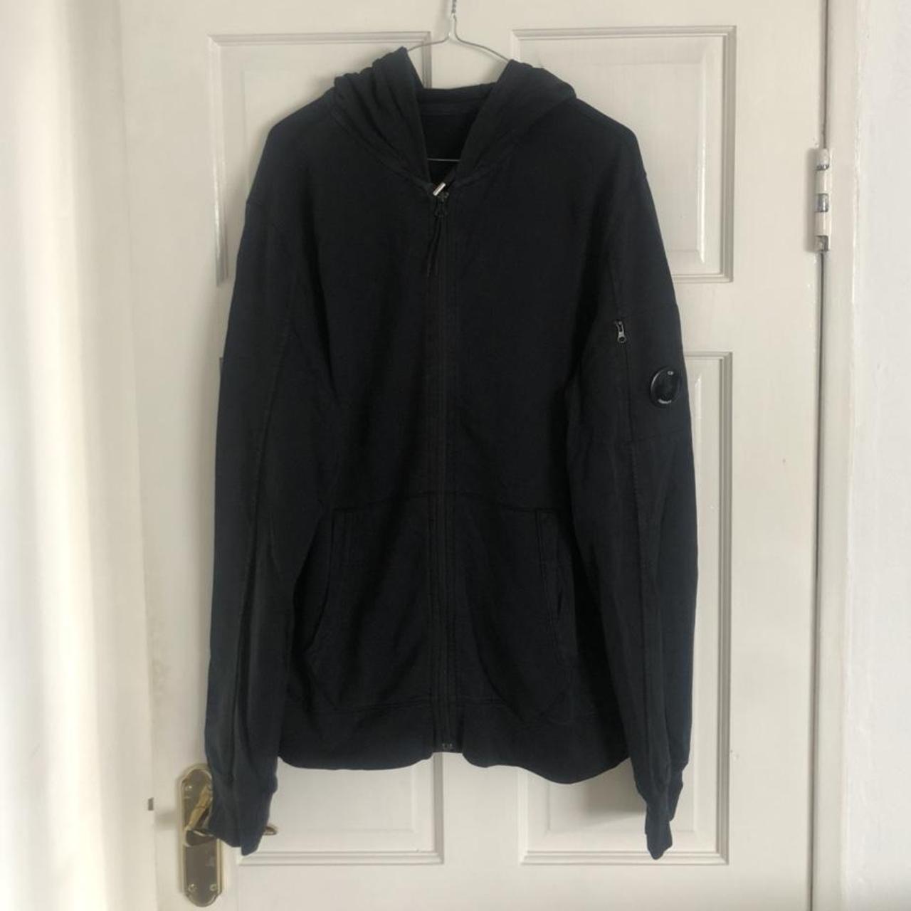 Black CP Company Hoodie Tag says it’s XL, fits more... - Depop