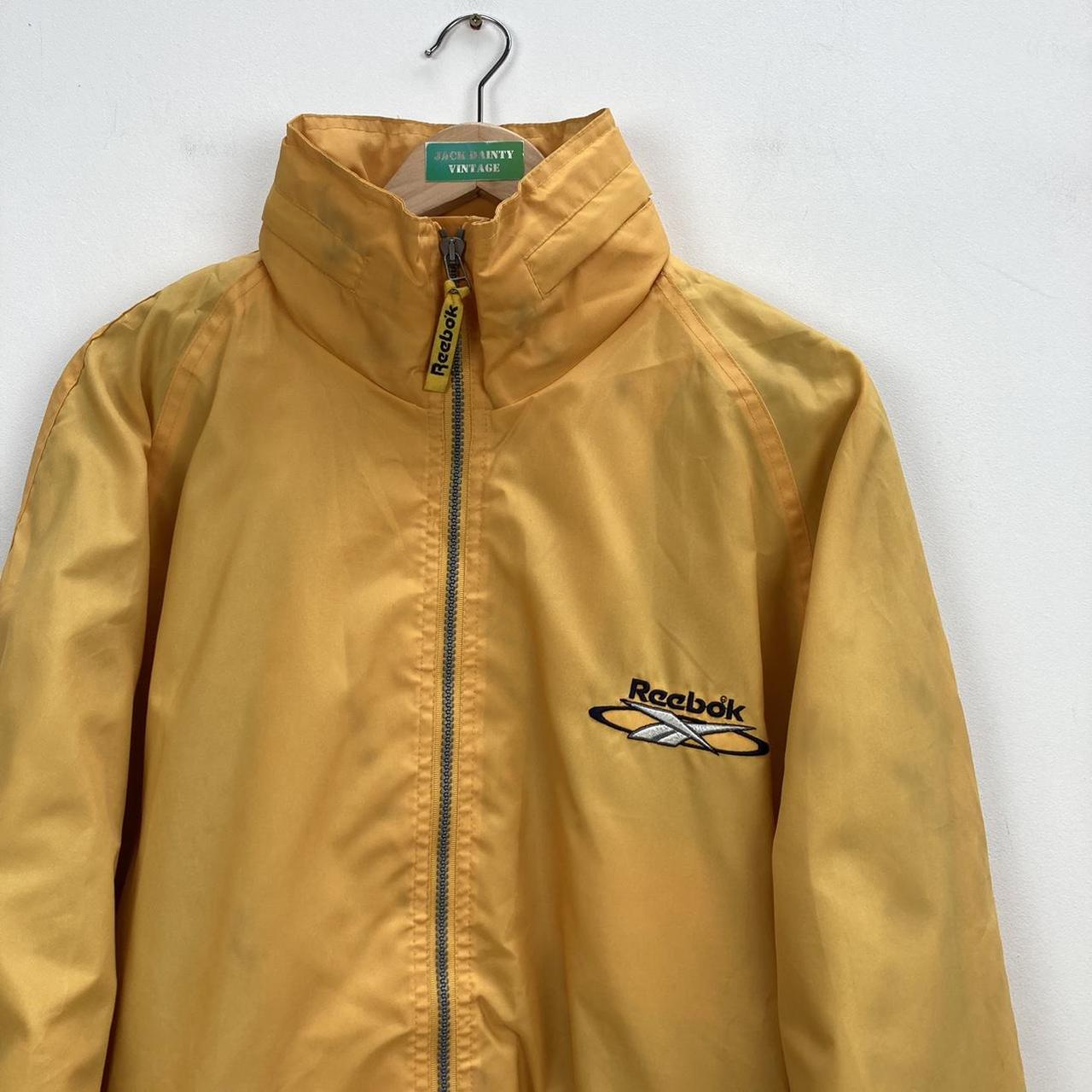 Reebok jacket deals yellow