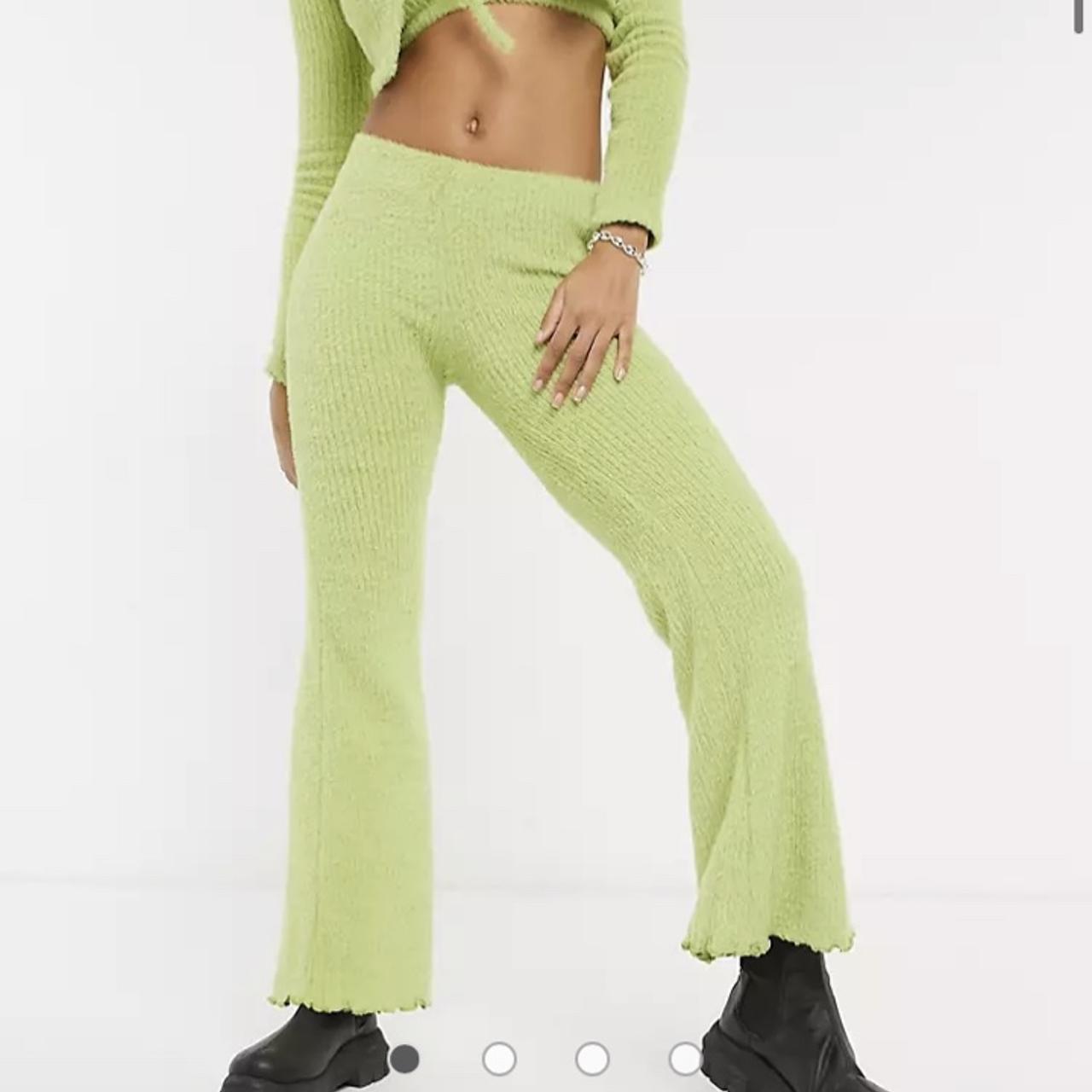 Green fluffy flared trousers from bershka Size... Depop