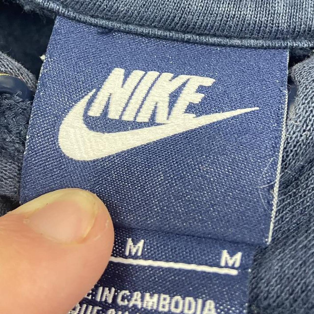 Iconic Nike stitch hoodie in navy with kangaroo... Depop