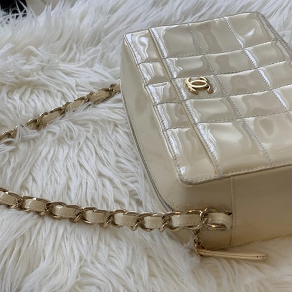 Vintage Chanel bag from the 1990s. Patent off-white