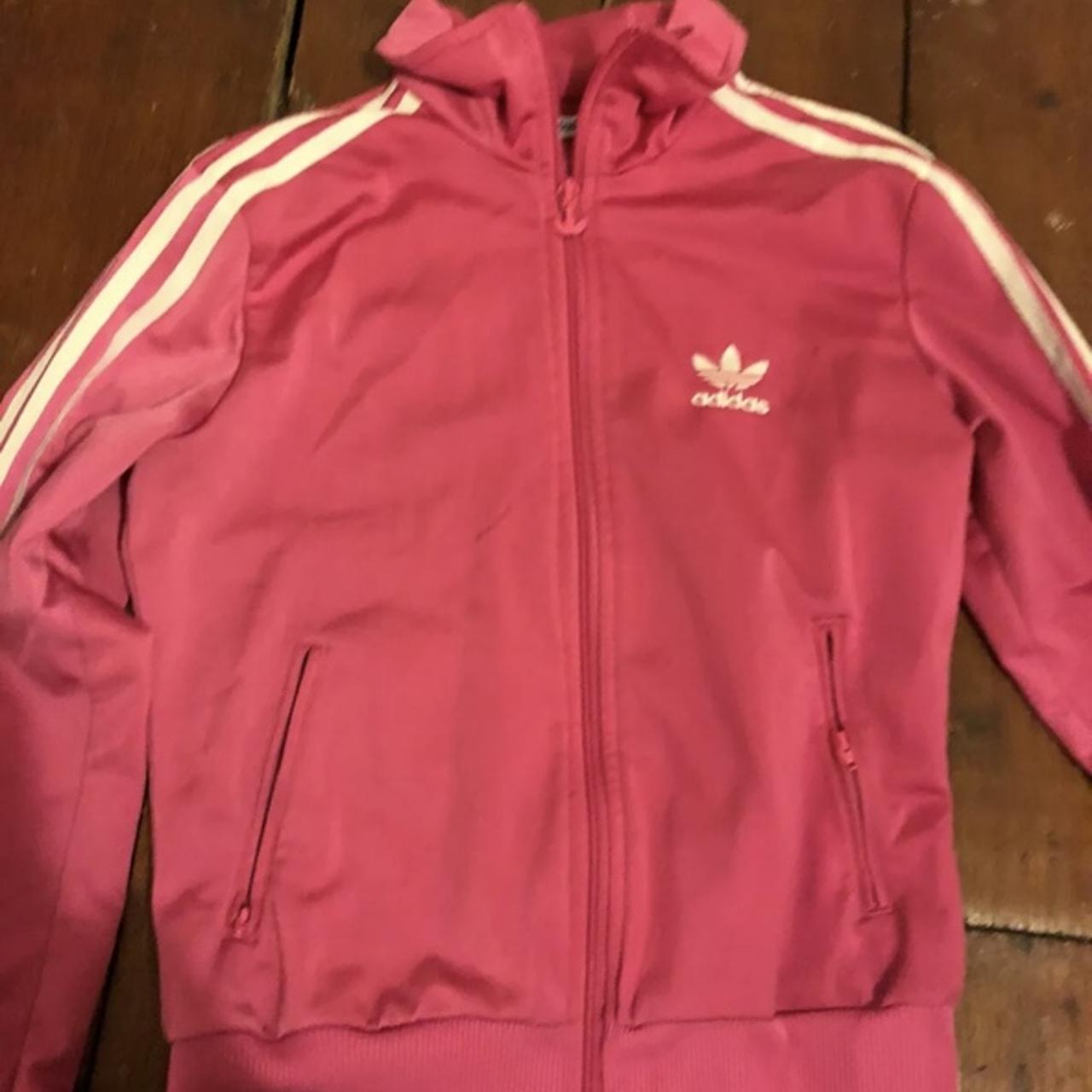 Bright pink Adidas zip up tracksuit style jacket. It... - Depop