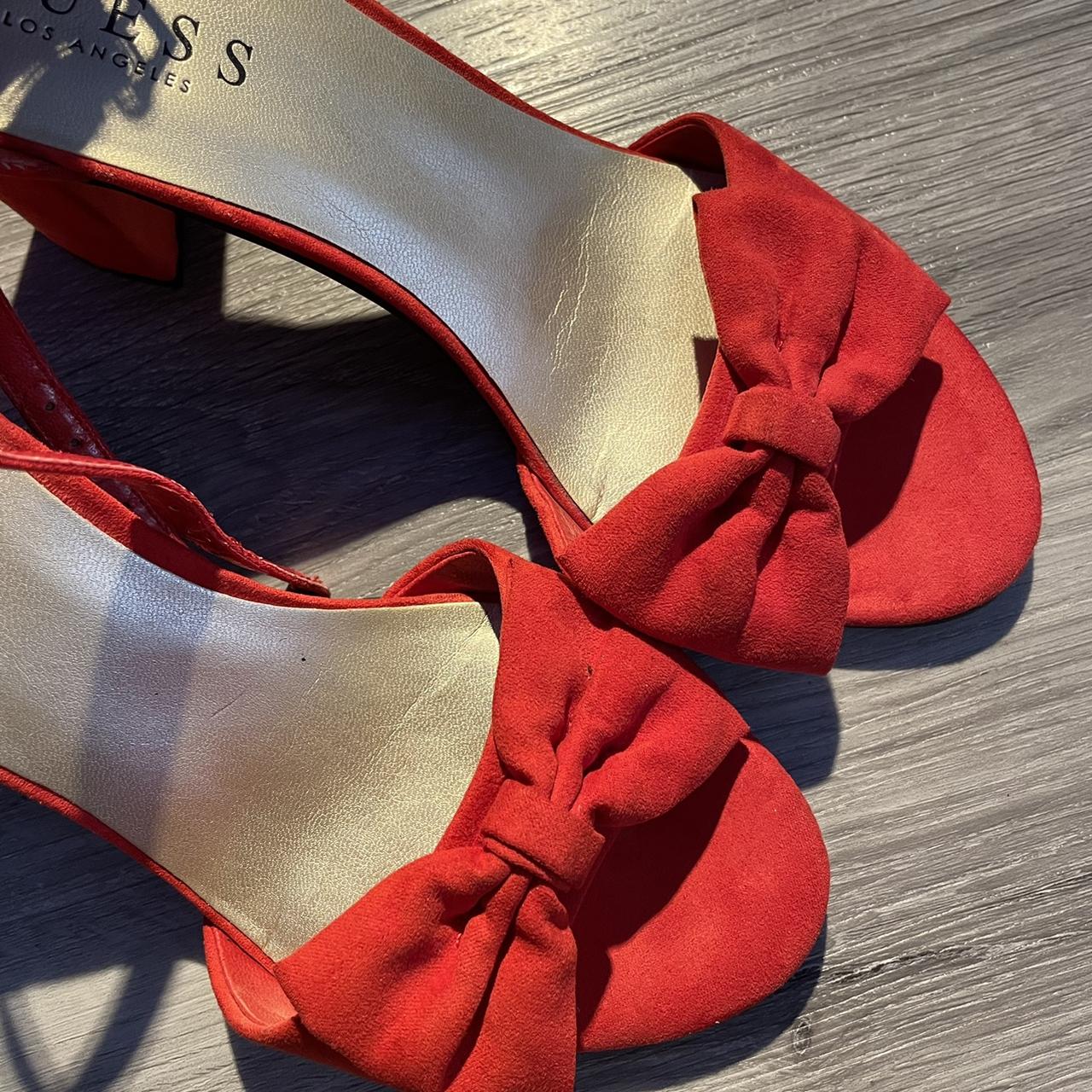 guess red high heels