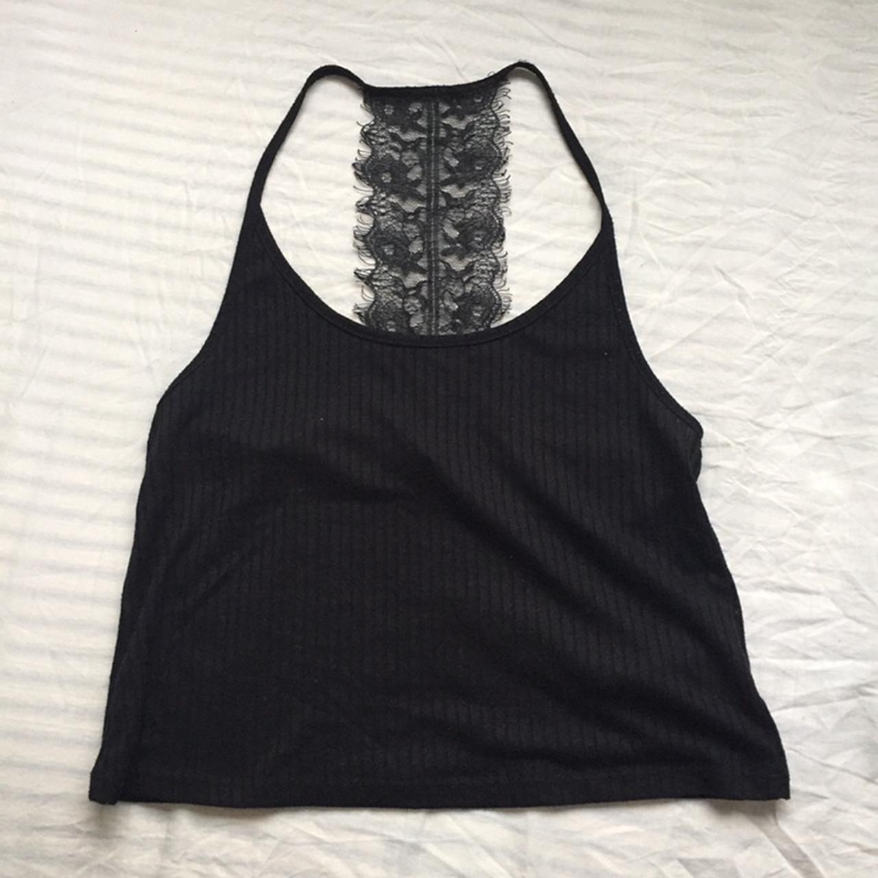 Black ribbed halterneck vest with lace down the... - Depop