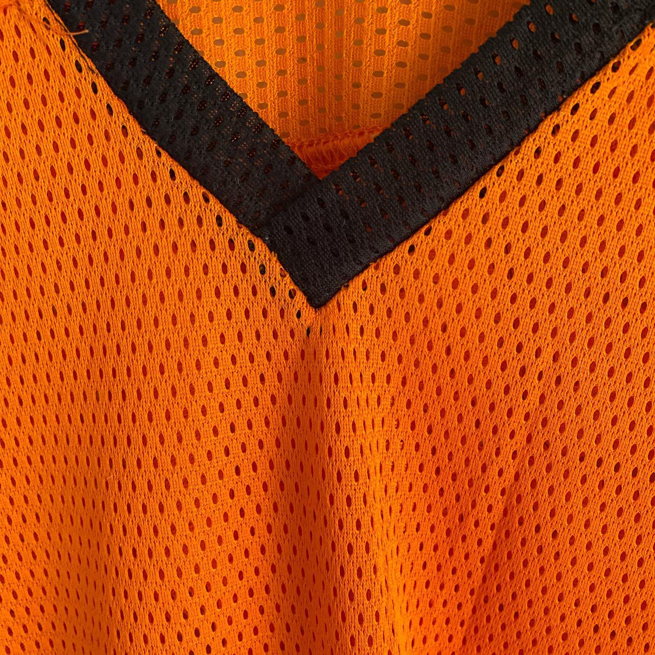 Vintage mesh football jersey in spooky color way.... Depop