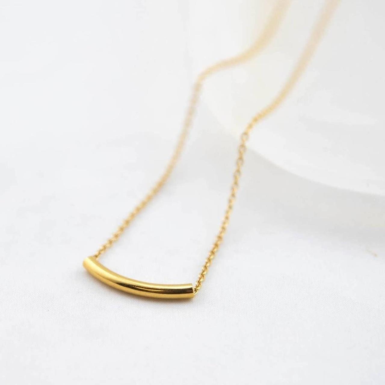 Gold Curved Tube Necklace This simple gold curved... Depop