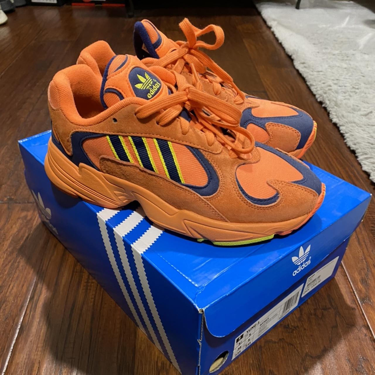 Orange adidas yung trainers online