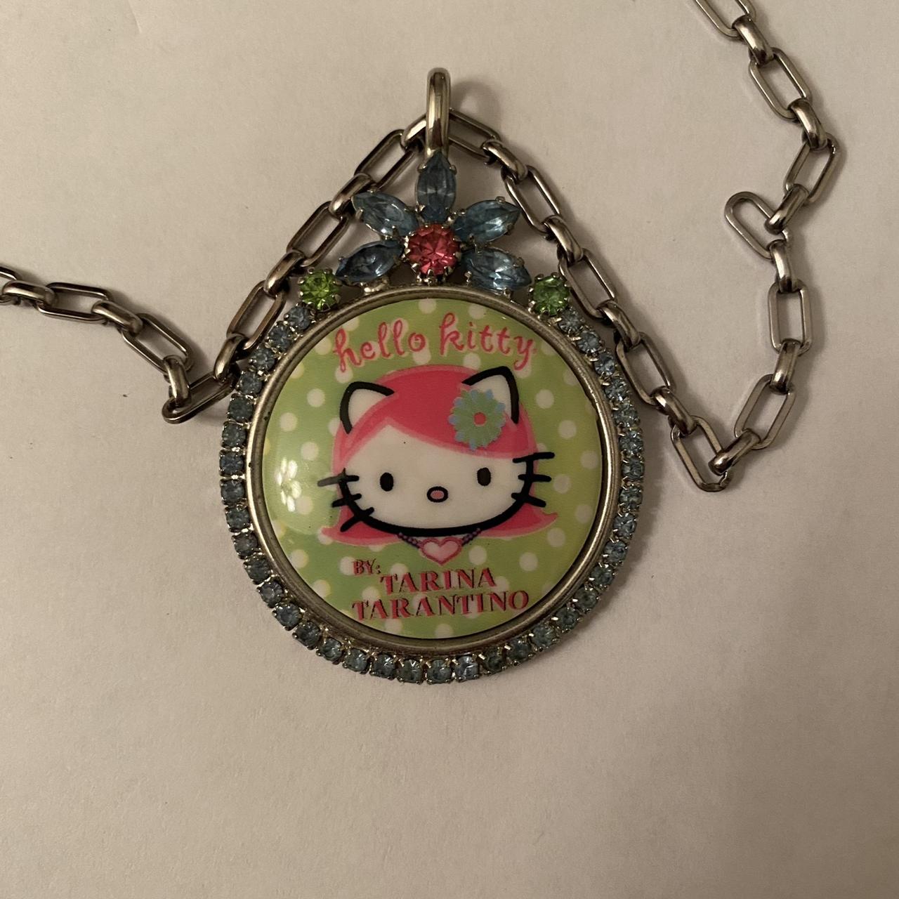 Tarina Tarantino Hello Kitty pink head necklace... - Depop