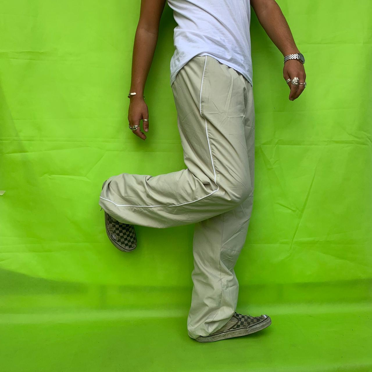 Vintage beige Nike joggers tracksuit bottoms with... Depop