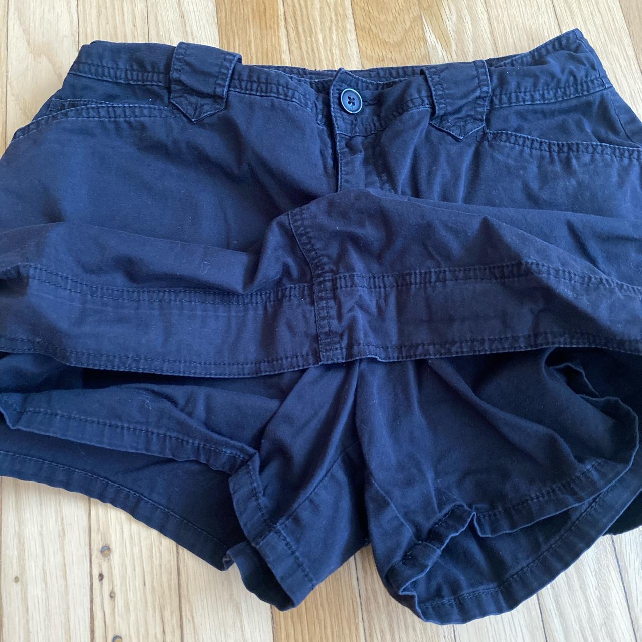 Black Mini Cargo Skirt. zipper front and button. Has... Depop
