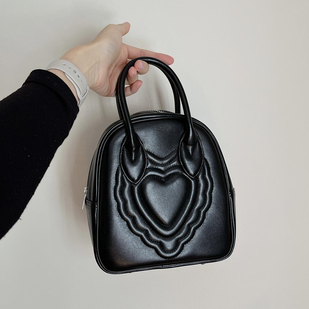 Comme des garcons shop 3 hearts backpack