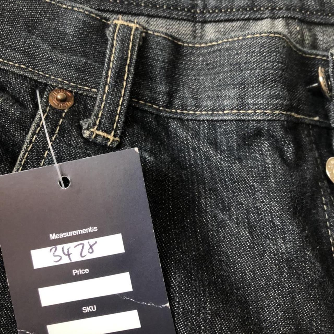 Evisu baggy jeans with detailing on back pockets and... - Depop
