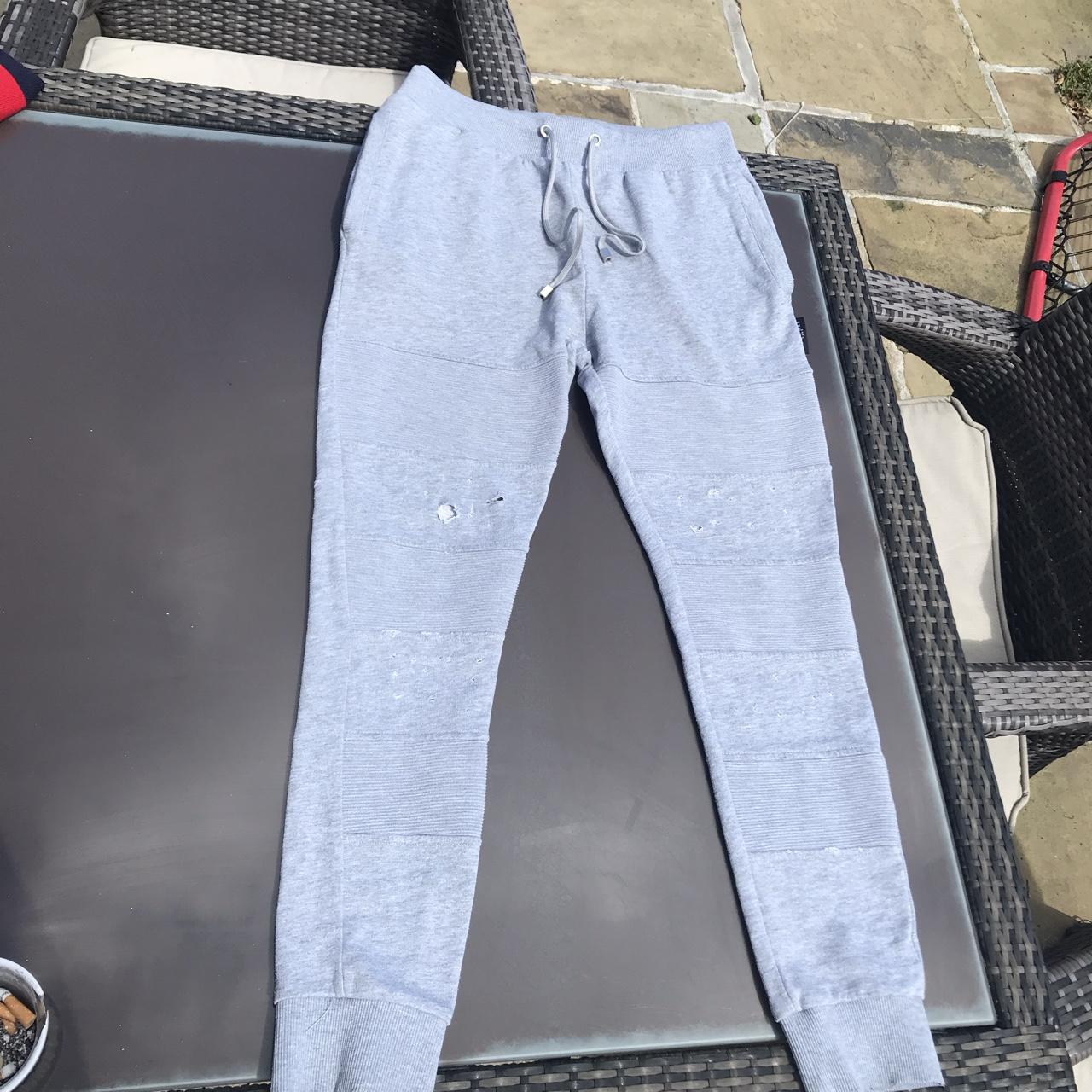 Large grey The Coture Club joggers, (holes are Depop
