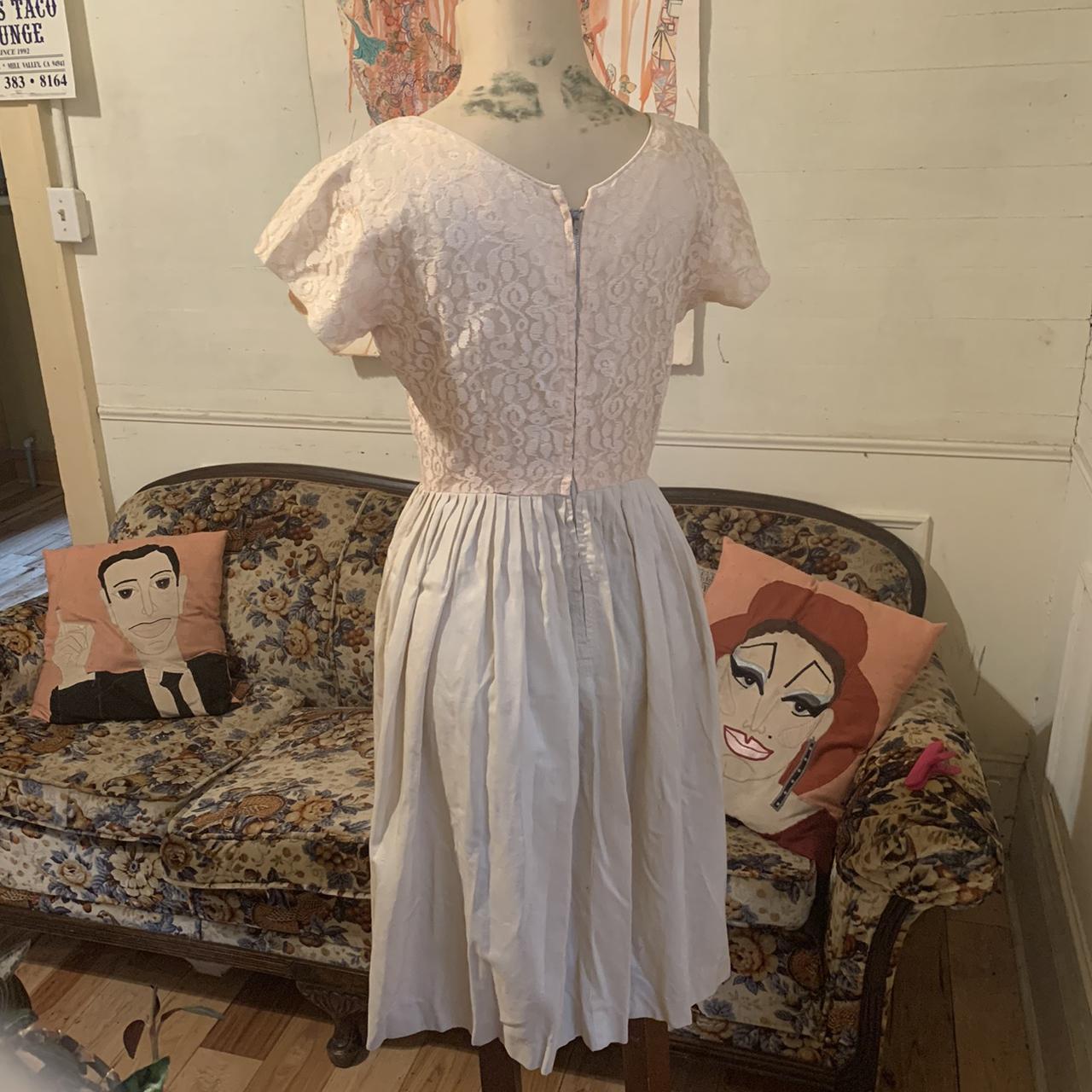 This is a vintage cotton and lace dress from the... Depop