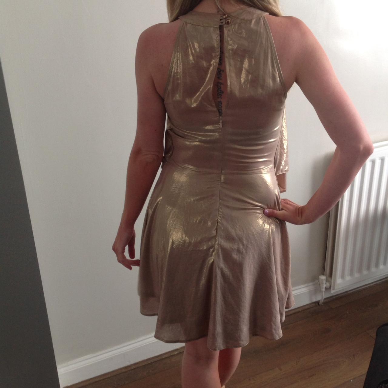 Metallic gold skater dress from Chelsea Girl at... Depop