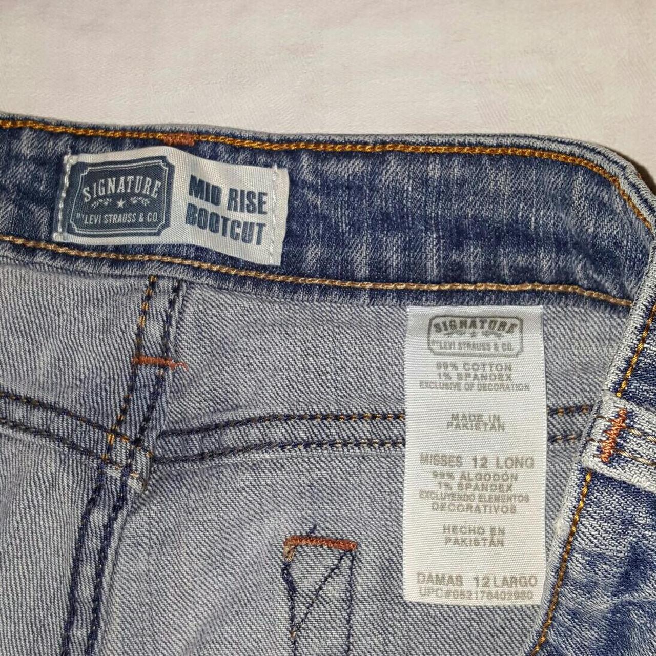 signature levi strauss mid rise bootcut jeans size... - Depop