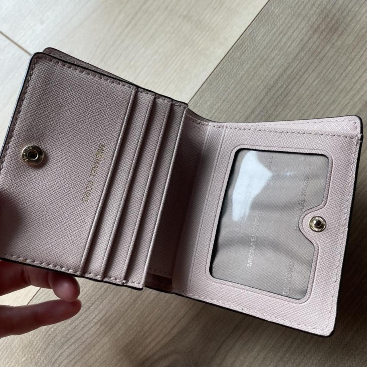 Pink Michael Kors wallet Definitely used as seen in - Depop