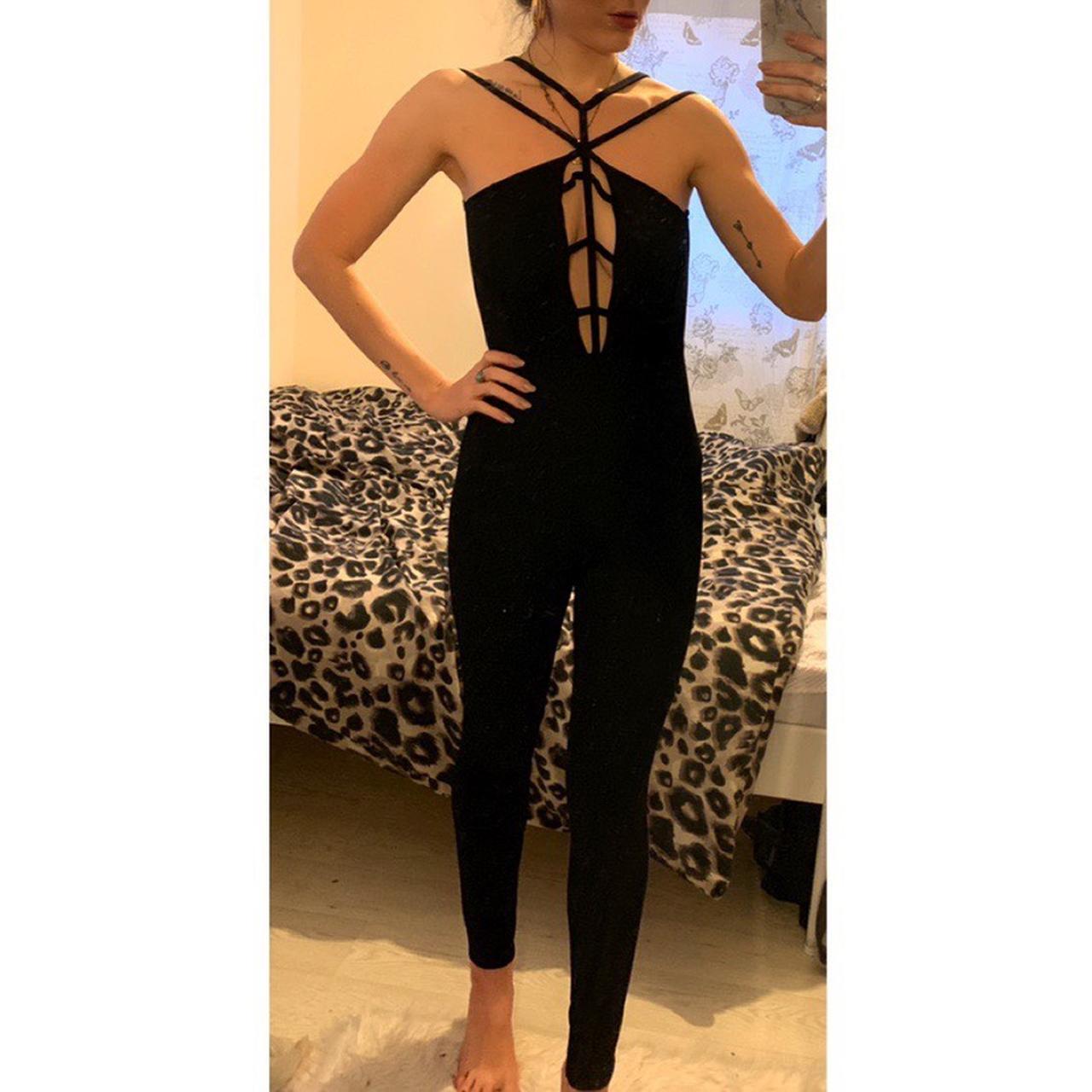 Black Caged Strappy Jumpsuit Swipe For More Depop