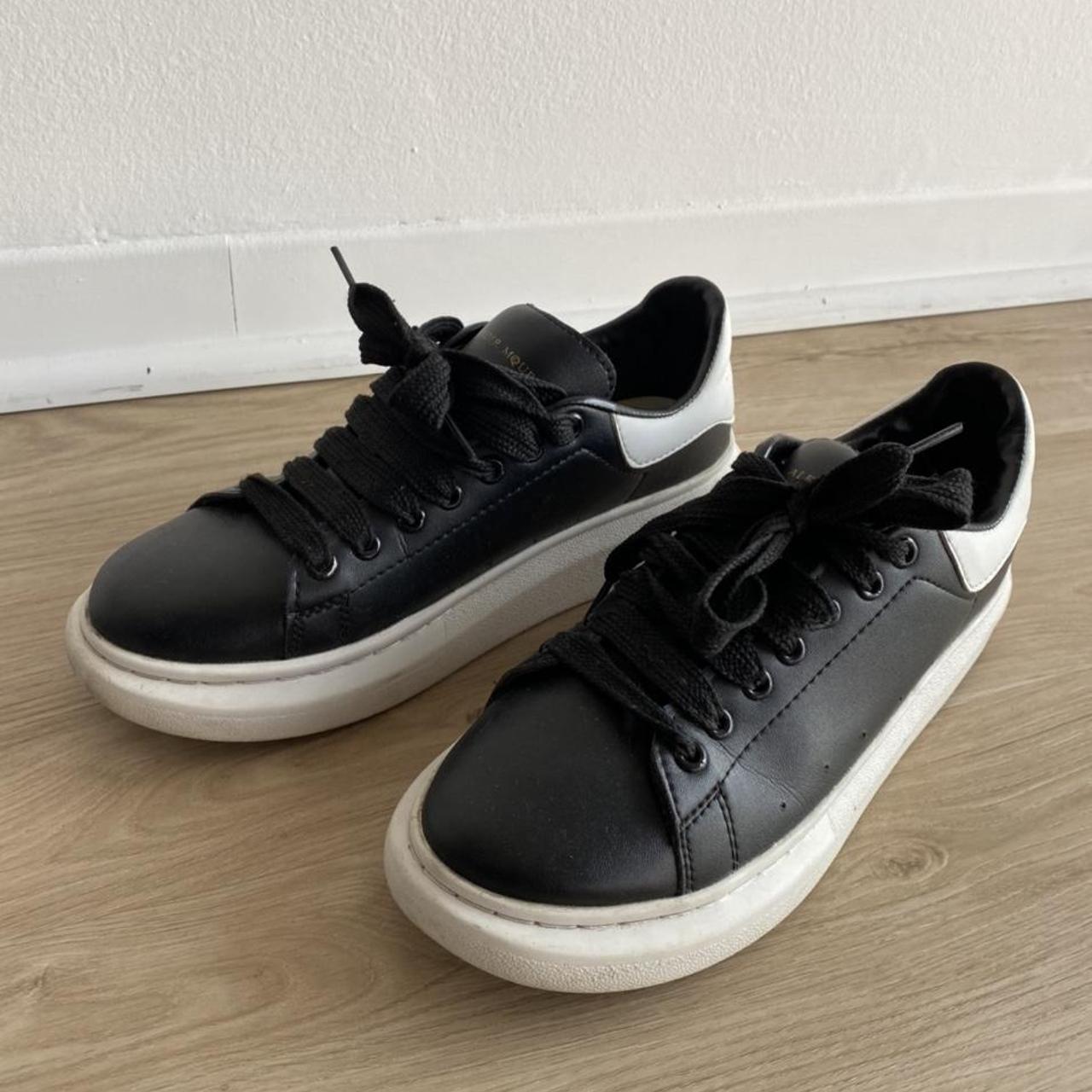 Alexander McQueen sneakers Black leather / white soles - Depop